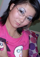 Азиатка в очках сфоткала сиськи 2 фотография