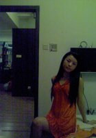 Молоденькая азиаточка в ванной стоит в одном белье 1 фото