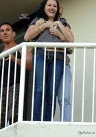 Сучки с обнаженными титьками веселятся на балконе 13 фото