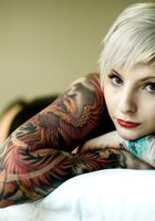 Татуированные нимфы позируют без одежды 15 фотография
