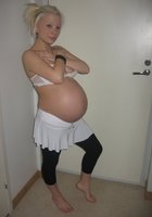 Беременные жены со стоячими сосками оголяют животы и письки 12 фото