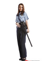 Сексуальная полицейская в студии снимает с себя униформу 1 фото